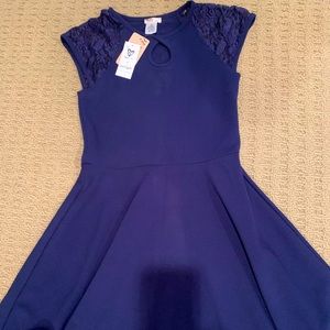Perfect party dress. Navy Sally Miller Couture w/eyelet neck, lace-cap sleeve